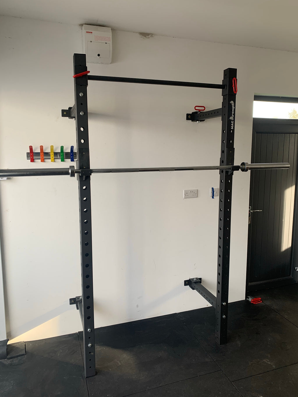 Folding squat rack
